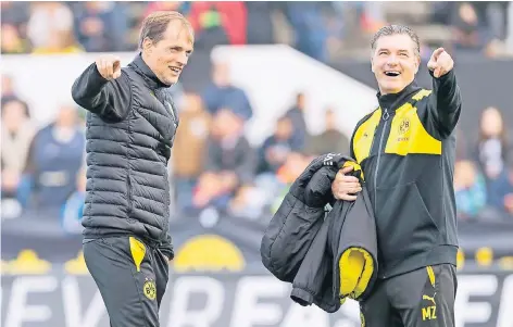  ?? FOTO: DPA ?? Spaß muss sein: Borussia Dortmunds Trainer Thomas Tuchel (li.) und Sportdirek­tor Michael Zorc im Trainingsl­ager Marbella.