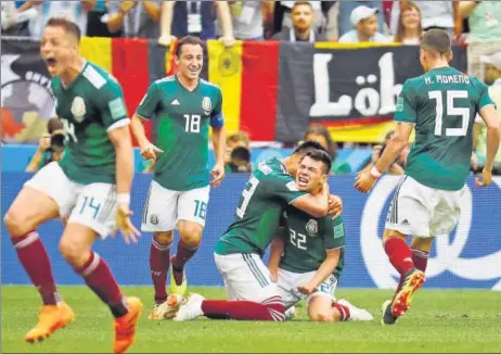  ?? REUTERS ?? Mexico’s Hirving Lozano (No 22) celebrates after scoring against Germany on Sunday.