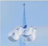  ?? ?? Mmembers of South Korea’s ‘Black Eagle’ aerobatics team perform during an aerial display.