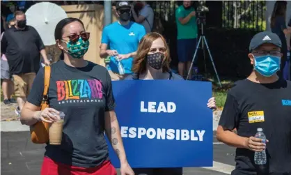  ?? ?? Employees protest Activision Blizzard in Irvine, California, on 28 July 2021. Photograph: David McNew/AFP/Getty Images