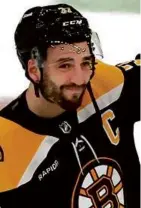  ?? JOHN TLUMACKI/GLOBE STAFF ?? Did Patrice Bergeron wave goodbye to Boston fans for good at the finish of Game 7?