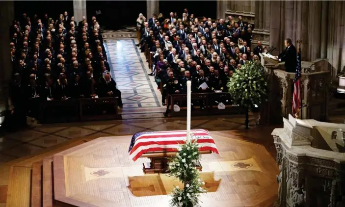  ??  ?? Former president George W Bush delivers his eulogy during a funeral service at the National Cathedral in Washington DC on Wednesday. Photograph: Mandel Ngan/AFP/Getty Images