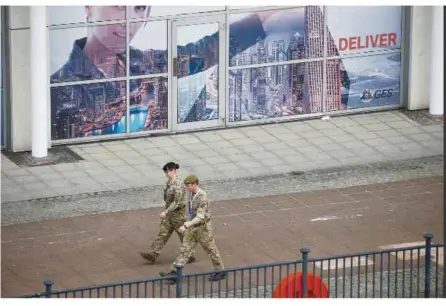  ?? — Reuters ?? Soldiers patrol an empty Saint Mark’s Square on Palm Sunday in Venice, Italy.