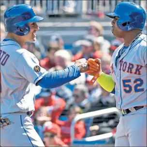  ?? Getty Images ?? MAN IN THE MIDDLE: Michael Conforto (left), celebratin­g his homer with Yoenis Cespedes on Thursday, is expected to get most of the starts in center field.