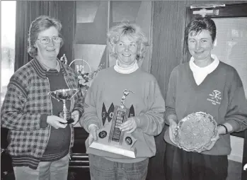  ?? B19twe03 ?? ALGU trophy winners for the 1996/1997 season: Morag Gardner (Cir Mhor), Ellie Jones (island champion) and Linda Johnston (Drumadoon Tray).