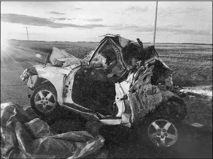  ?? Cp pHoto ?? A court exhibit photo shows the aftermath of an accident which killed three teens near Spalding, Sask.