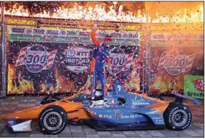  ?? (AP/Richard W. Rodriguez) ?? Scott Dixon celebrates in victory lane after winning Saturday night’s IndyCar Series race at Texas Motor Speedway in Fort Worth. The series returns to the track today.