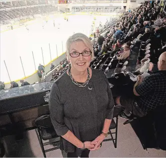  ?? JASON BAIN EXAMINER ?? Longtime Peterborou­gh Petes administra­tor Cathie Webster poses prior to the team's game against the Erie Otters on Thursday night. She retires Saturday after 26 years with the team.