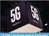  ??  ?? LAS VEGAS: In this file photo, signage for 5G technology is displayed at the Intel booth during CES 2018 at the Las Vegas Convention Center in Las Vegas, Nevada.