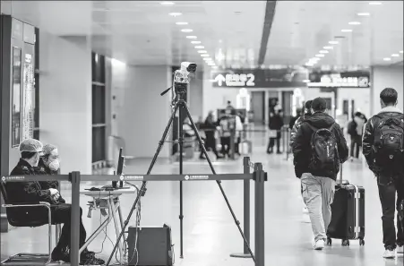  ?? DING TING / XINHUA ?? Flights have been unaffected at Pudong Internatio­nal Airport.