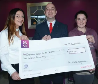  ??  ?? Grace Kinsella, Marketing Manager D Hotel and Rory Tully General Manager D Hotel Presenting Ronnie Beazley with a cheque For Drogheda Cares for the Homeless at the D Hotel