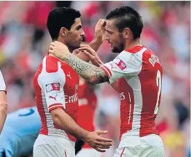  ??  ?? Arsenal’s Mikel Arteta, left, and Mathieu Debuchy.