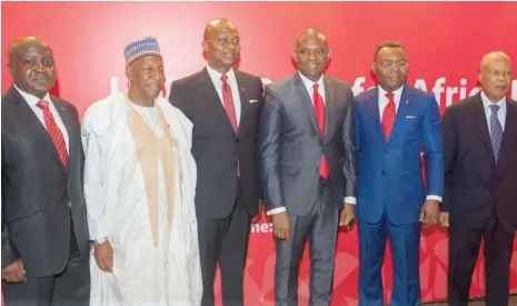  ??  ?? From left: Executive Director, UBA Plc, Mr. Ibrahim Puri; Director, Alhaji Ja’afaru Paki; Group Managing Director/ CEO, Mr. Kennedy Uzoka; Group Chairman, Mr. Tony O. Elumelu; Deputy Managing Director, Mr. Victor Osadolor; Director, Alhaji Yahaya...