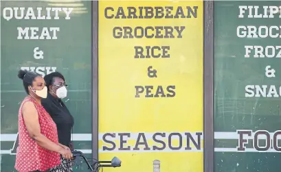  ?? RENÉ JOHNSTON TORONTO STAR FILE PHOTO ?? According to Cheryl Blackman, director of museums and heritage services for the city, “Little Jamaica is the heartbeat of Black- and Caribbean-owned business in Toronto.” But the area is still “officially” referred to as the York-Eglinton Internatio­nal Market.