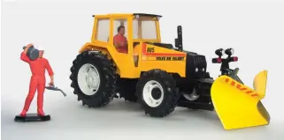  ??  ?? ▲ For the new Autoway series, Britains issued its Volvo BM Valmet 805 tractor in yellow and supplied it with a snow plough and an extra figure.