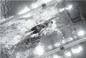  ?? Tom Pennington/getty Images ?? Katie Ledecky competes in the women’s 800-meter freestyle final on Friday. Her 22 medals are the most for a female swimmer in world championsh­ips history.