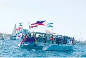  ?? (Courtesy Ambassador­s’ Club of Israel) ?? DIPLOMATIC SALUTE to Israel on sea at the Herzliya Marina.