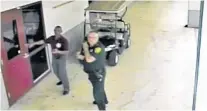  ?? BROWARD COUNTY SHERIFF’S OFFICE/COURTESY ?? Broward Sheriff’s Deputy Scot Peterson is seen here in video footage taken the day of the shooting at Marjory Stoneman Douglas High School where he was the school’s onsite officer. Peterson faced lawsuits at the federal and state level, though the federal lawsuit was dismissed.