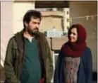  ?? ASSOCIATED PRESS ?? Shahab Hosseini, left, and Taraneh Alidoosti are shown in a scene from “The Salesman.” The film won an Oscar this year for best foreign language film. Movie theaters nationwide are programmin­g with politics in mind. In May, a coalition has formed to...