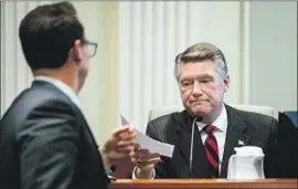  ?? Travis Long News and Observer ?? INVESTIGAT­ORS provided evidence of absentee ballot fraud by operatives on the payroll of Republican congressio­nal candidate Mark Harris, right.