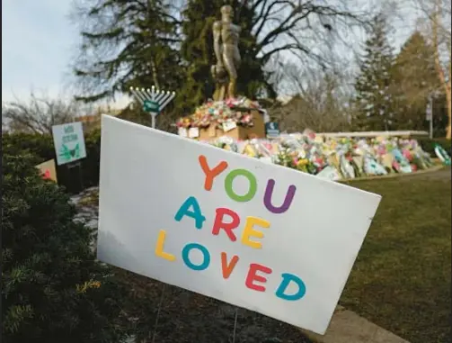 ?? GETTY; AP ?? A sign of love greets students as they return to Michigan State University in February after a gun rampage by Anthony McRae (below) left three students dead for. A note written by McRae and released by authoritie­s offers hint into his state of mind.