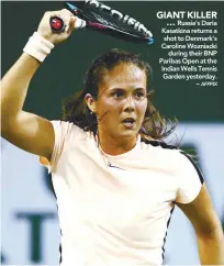  ?? AFPPIX ?? Russia’s Daria Kasatkina returns a shot to Denmark’s Caroline Wozniacki during their BNP Paribas Open at the Indian Wells Tennis Garden yesterday. –