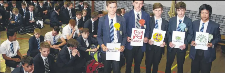  ?? Picture: Paul Amos FM4800596 ?? Year 10 students hear from the main parties, from left Lib Dem Giacomo Oldfield, Labour’s Dan Fitch, Xavier Standard, for Ukip, Conservati­ve Kai Cooper and Nixon Budha for the Greens