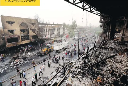  ?? HADI MIZBAN / THE ASSOCIATED PRESS ?? The car bombing struck Baghdad’s Karrada neighbourh­ood, a busy shopping district where families lined the streets early Sunday. At least 121 were killed and hundreds injured.