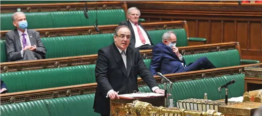  ?? ?? Surrounded by empty green leather: Paymaster General Michael Ellis receiving the opposition’s snarls yesterday