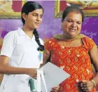  ?? Photo: Parliament of Fiji ?? Oratory contest winner Priyanka Anjani Pillay of Sabeto College with school principal Shelly Imran.