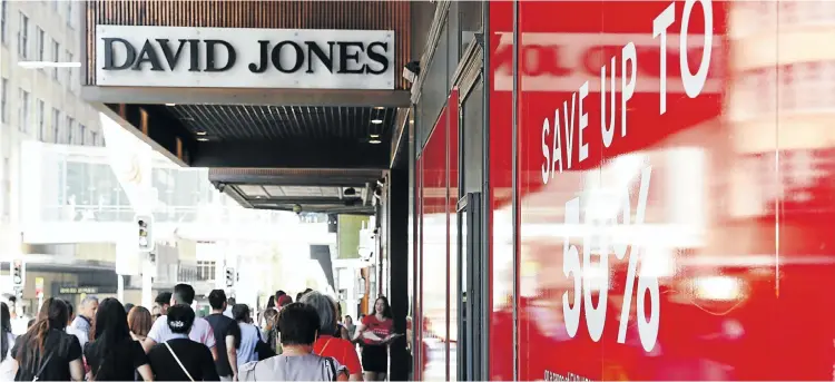  ?? Picture: Getty Images/Hanna Lassen ?? Shoppers outside a David Jones store in Sydney during the Boxing Day sales last year. Boxing Day is one of the busiest days for retail outlets in the city, with thousands taking advantage of post-Christmas sale prices.
