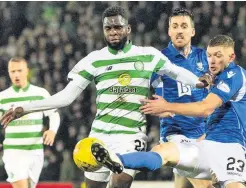  ??  ?? Tussle Liam Gordon puts the brakes on Odsonne Edouard on Wednesday