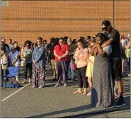  ?? MEDIANEWS GROUP FILE PHOTO ?? Two days after the explosion, a crowd of several hundred gathered at Pottstown High School and joined in prayer for the victims.