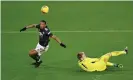  ??  ?? Anthony Martial nips in ahead of Aaron Ramsdale to score a long-awaited league goal in this campaign. Photograph: Laurence Griffiths/Reuters