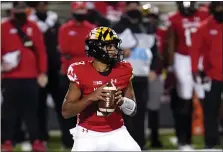  ?? JULIO CORTEZ — THE ASSOCIATED PRESS ?? Maryland quarterbac­k Taulia Tagovailoa looks to pass against Minnesota during the first half Saturday in College Park, Md.