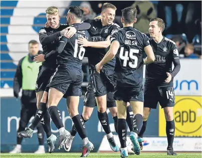  ?? SNS. ?? Falkirk players celebrate their 6-1 victory over United – a result which shocked Allan Johnston.