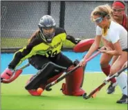  ?? GENE WALSH — DIGITAL FIRST MEDIA ?? Germantown Academy goalie Hannah Santos works to keep in front of Academy of Notre Dame’s Mia Leonhardt during the PAISAA championsh­ip at The Proving Grounds Wednesday.