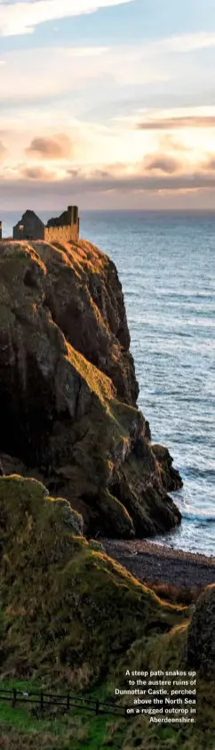  ??  ?? A steep path snakes up to the austere ruins of Dunnottar Castle, perched above the North Sea on a rugged outcrop in Aberdeensh­ire.