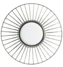  ??  ?? add edge with a Black metal industrial round wire wall mirror, £64, the Farthing Buy now with ownable