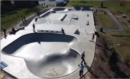  ?? MAINSCREEN­SHOT OF ONLINE VIDEO ?? Newly installed trees and benches can be seen around the edges of the Lansdale skate park in an aerial video shot by borough employee Kevin Kissinger and posted on the borough Parks department’s Facebook page.