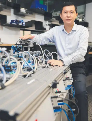  ?? Picture: JUSTIN BRIERTY ?? FUTURE FOCUS: JCU's Wei Xiang has done research into autonomous cars and predicts we will see them in Cairns within the decade.