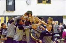 ?? KYLE FRANKO — TRENTONIAN PHOTO ?? Bordentown’s Sean Pedersen, center, is congratula­ted by teammates after winning his 152-pound over Allentown’s Anthony Heinz to give the Scotties a victory in the Central Jersey 3 match on Monday night.
