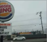  ?? GARY PULEO - DIGITAL FIRST MEDIA ?? The corner of Ridge Pike and Trooper Road, long dominated by Burger King, is making room for discounted grocery king Lidl across from the fast-food icon.