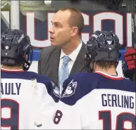  ?? Stephen Slade / Associated Press ?? UConn coach Mike Cavanaugh gathers his team during a game against Union in Storrs in 2013.