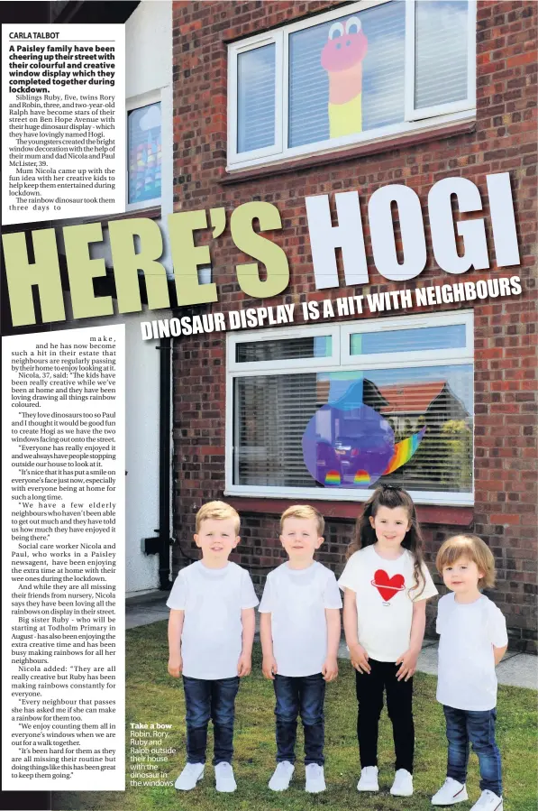  ??  ?? Take a bow Robin, Rory, Ruby and Ralph outside their house with the dinosaur in the windows