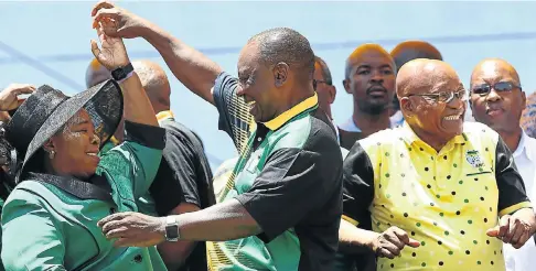  ?? Picture: Masi Losi ?? Nkosazana Dlamini-Zuma dances with ANC president Cyril Ramaphosa, alongside President Jacob Zuma, at the ANC’s birthday bash in East London yesterday.