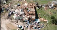  ?? (AP/The Wichita Eagle/Jaime Green) ?? A home is destroyed from a possible tornado Saturday near Andover, Kan.