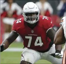  ??  ?? In this Sept. 23, file photo, Arizona Cardinals offensive tackle D.J. Humphries (74) blocks during the first half during an NFL football game against the Chicago Bears in Glendale, Ariz. Humphries was placed on injured reserves, on Wednesday. AP PHOTO/RICK SCUTERI