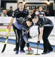  ?? MARK MALONE ?? Former skip Mike McEwan, front left, is relearning how to sweep alongside lead Colin Hodgson, right, and second Derek Samagalski after teaming up with friend and longtime rival Reid Carruthers.