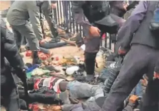  ?? // AMDH ?? Inmigrante­s retenidos por la Policía marroquí